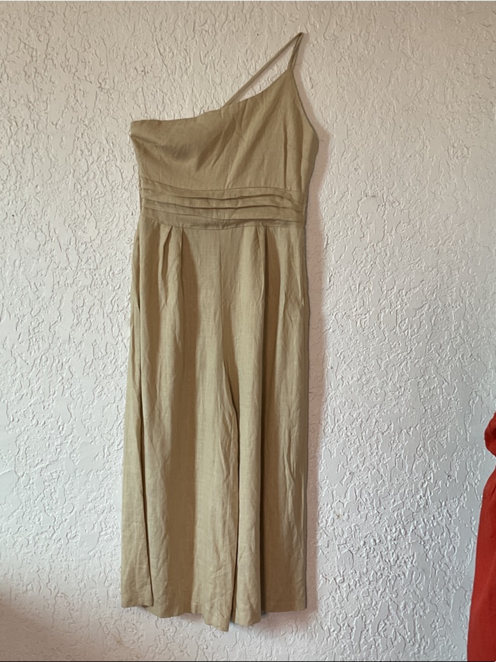 One-Shoulder Spaghettin Strap wide leg jumpsuit.
